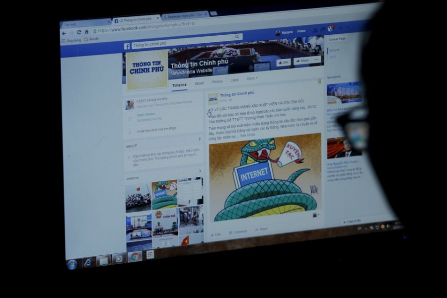 An internet user browses through the Vietnamese government's new Facebook page in Hanoi December 30, 2015.