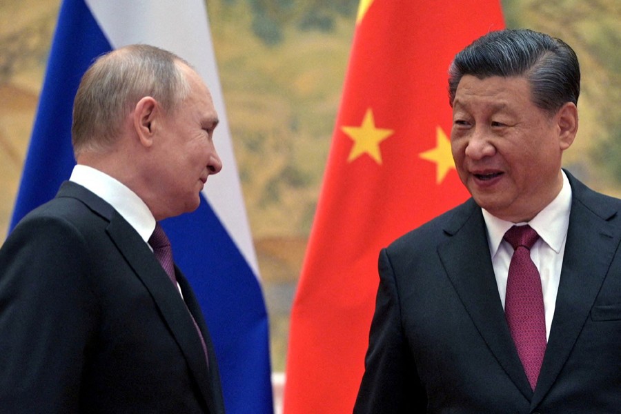 Russian President Vladimir Putin meets with Chinese President Xi Jinping in Beijing, China on February 4, 2022 — Sputnik/Kremlin via REUTERS file photo