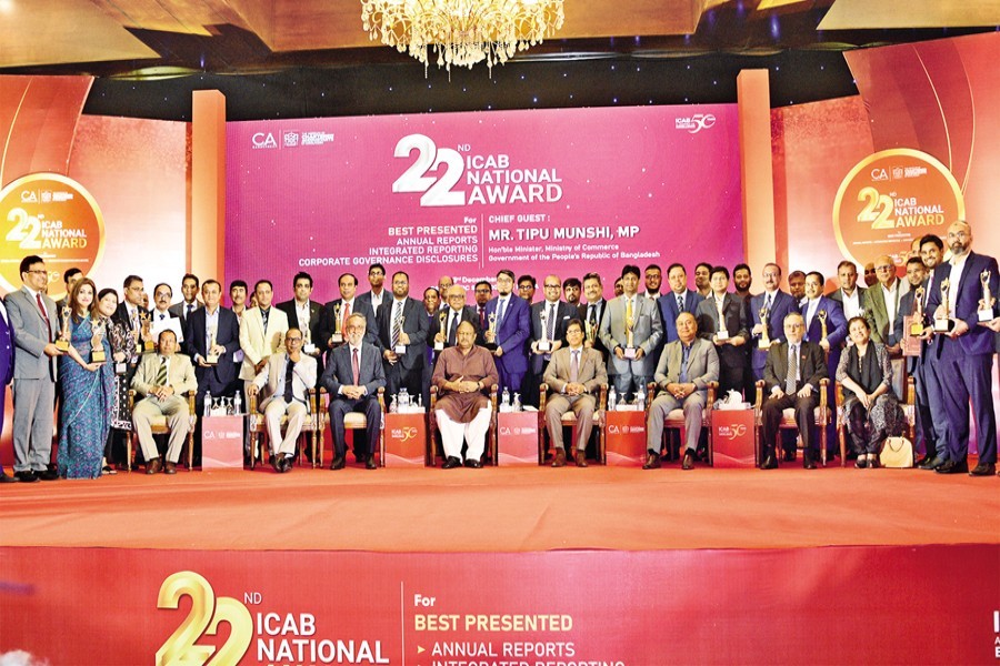 Commerce Minister Tipu Munshi and others including the recipients of the 22nd ICAB National Award at the award giving ceremony organised by the Institute of Chartered Accountants of Bangladesh (ICAB) at a city hotel on Saturday evening.