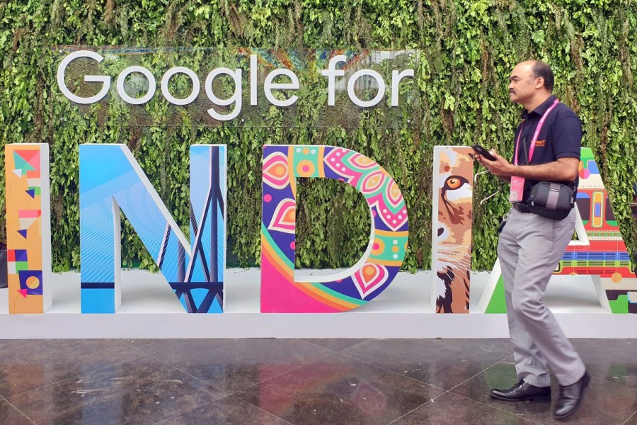 A man walks past the sign of "Google for India", the company's annual technology event in New Delhi, India, September 19, 2019. REUTERS/Sankalp Phartiyal/File Photo