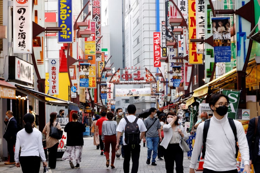 People make their way at Ameyoko shopping district in Tokyo, Japan, May 20, 2022. REUTERS/Kim Kyung-Hoon