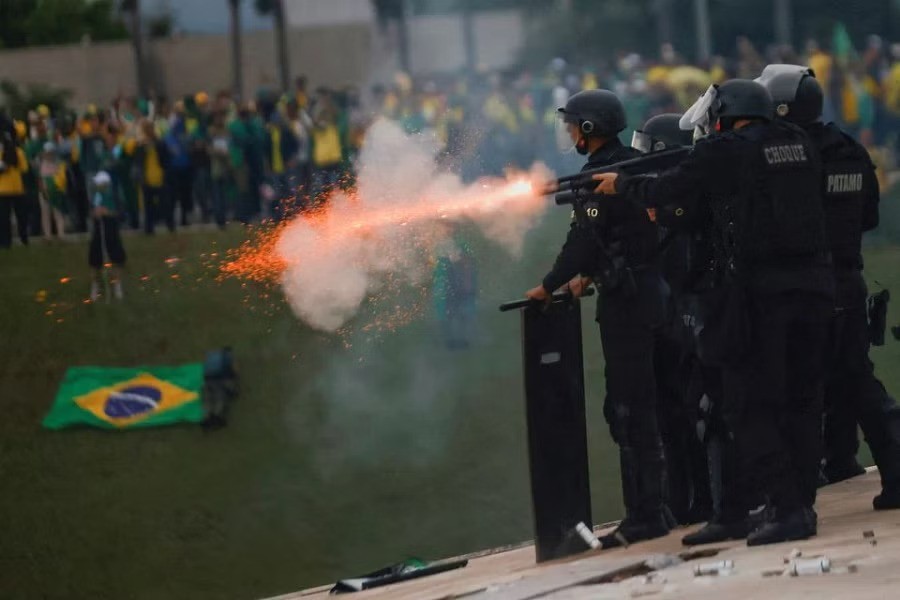 Security forces operate as supporters of Brazil's former President Jair Bolsonaro demonstrate against President Luiz Inacio Lula da Silva, outside Brazil’s National Congress in Brasilia, Brazil, January 8, 2023. REUTERS