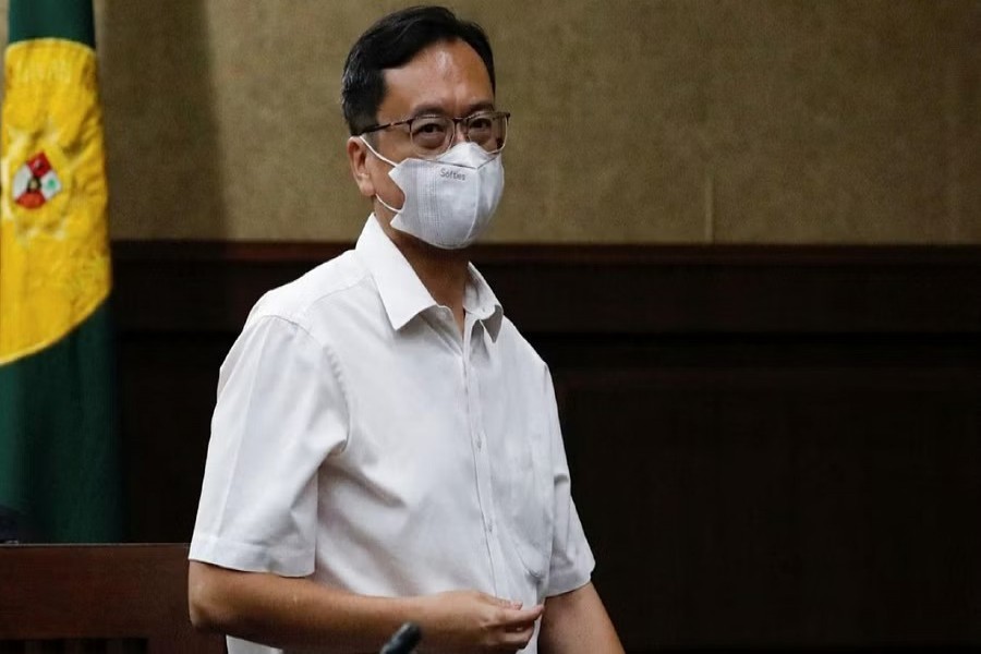 Benny Tjokrosaputro walks after a hearing on the allegation of manipulating investment decisions at a state insurance firm Asabri, at the court in Jakarta, Indonesia, Jan 12, 2023. REUTERS