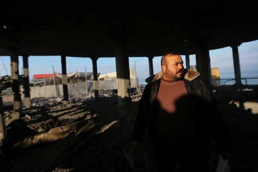 A Palestinian man inspecting a destroyed wedding hall in Gaza City on Monday after being attacked by Israeli aircraft –Reuters photo