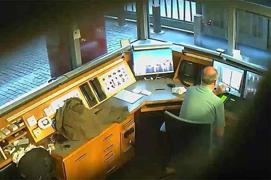 David Ballantyne Smith taking video of CCTV monitors at the security kiosk of the British Embassy in Berlin on August 3 in 2020 in this still image taken from a video played in court at the Old Bailey in London on February 13 this year –Reuters