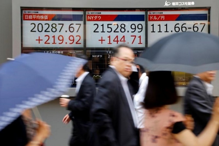 Asia stocks buoyant, dollar steadies after solid US job gains