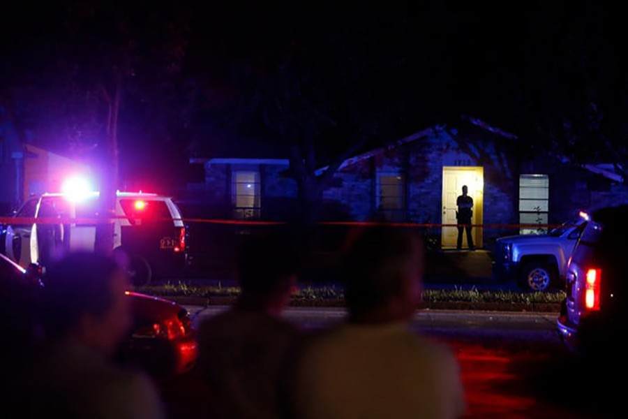 Police work the scene of a fatal shooting in Plano, a suburb north of Dallas on Sunday night. - Internet photo