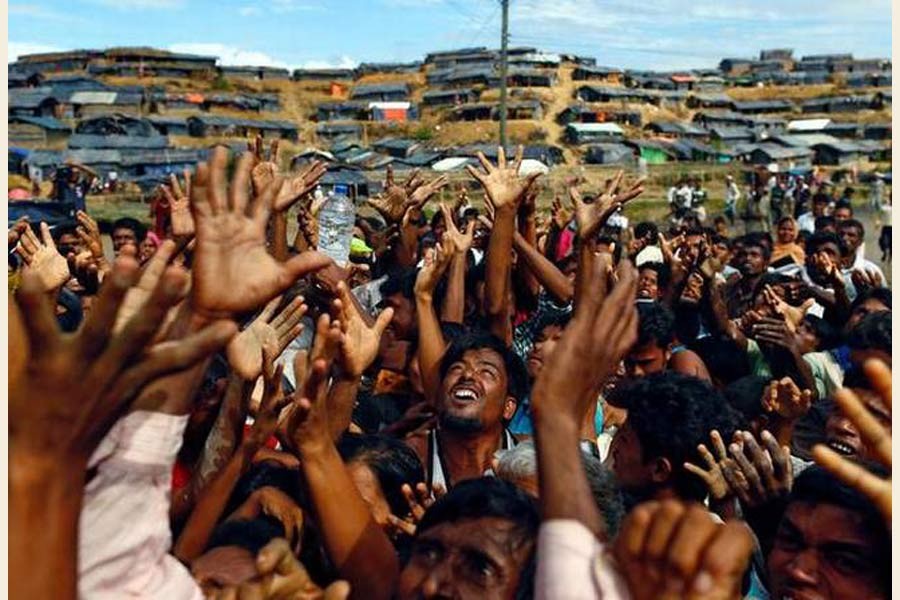 Three killed in stampede for aid near Rohingya camp