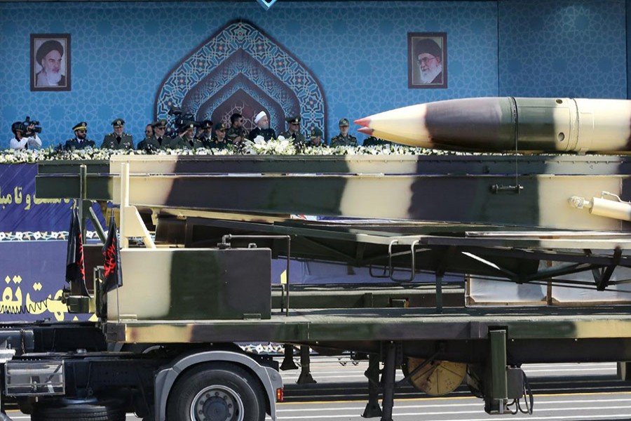 Missiles are displayed as Iranian President Hassan Rouhani attends an armed forces parade in Tehran, Iran on Friday. - Reuters photo