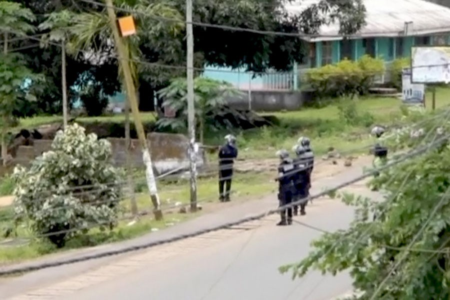 A still image taken from a video shows riot police patrol the English-speaking city of Buea, Cameroon October 1, 2017. (REUTERS TV)