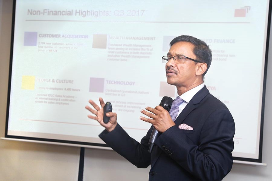 Managing Director of IDLC Finance Arif Khan disclosing the financial statement of Q3 in the city on Tuesday.