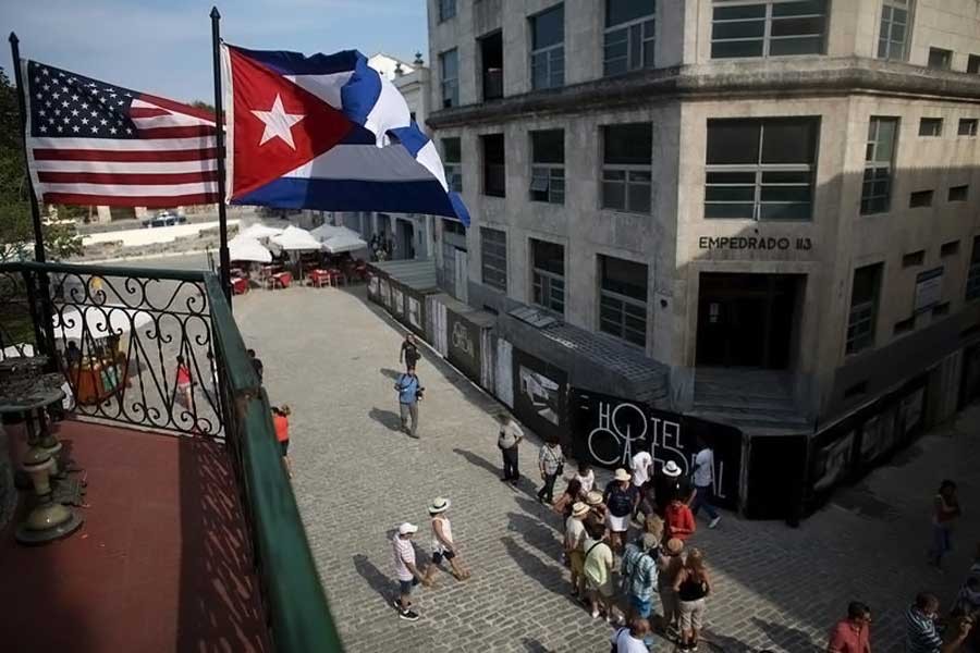 US and Cuban flags hang on the terrace of a restaurant in downtown Havana, March 17, 2016. (Reuters Photo)