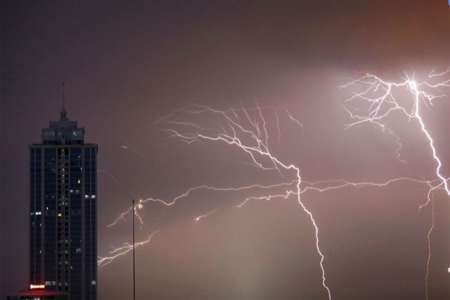 Lightning strikes behind commercial tower near a financial city in Colombo, Sri Lanka. (Reuters Photo)