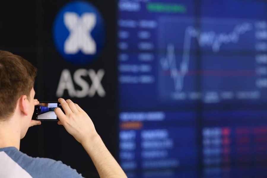 Australian shares hit 10-yr high