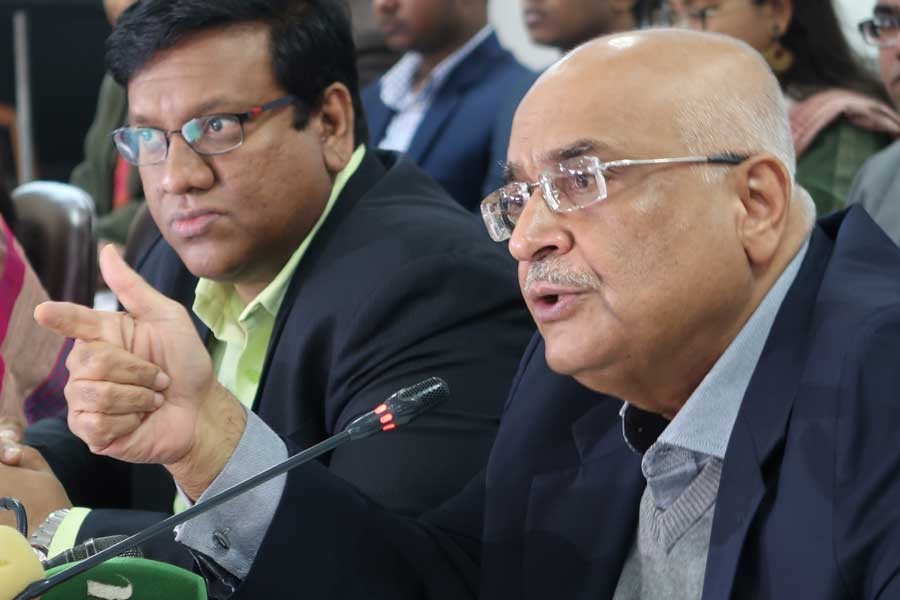 CPD's distinguished fellow Debapriya Bhattacharya addresses a press briefing on the half-year review of the country's economic situation at CIRDAP Auditorium in Dhaka on Saturday. -FE Photo
