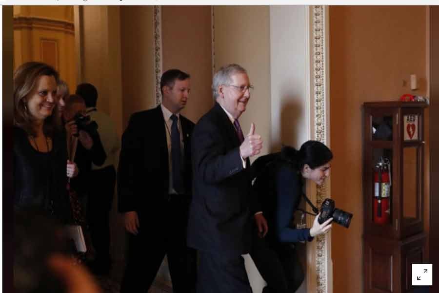 US Senate Majority Leader Mitch McConnell (R-KY) gestures to reporters after lawmakers struck a deal to reopen the federal government three days into a shutdown on Capitol Hill in Washington 22, 2018. Reuters