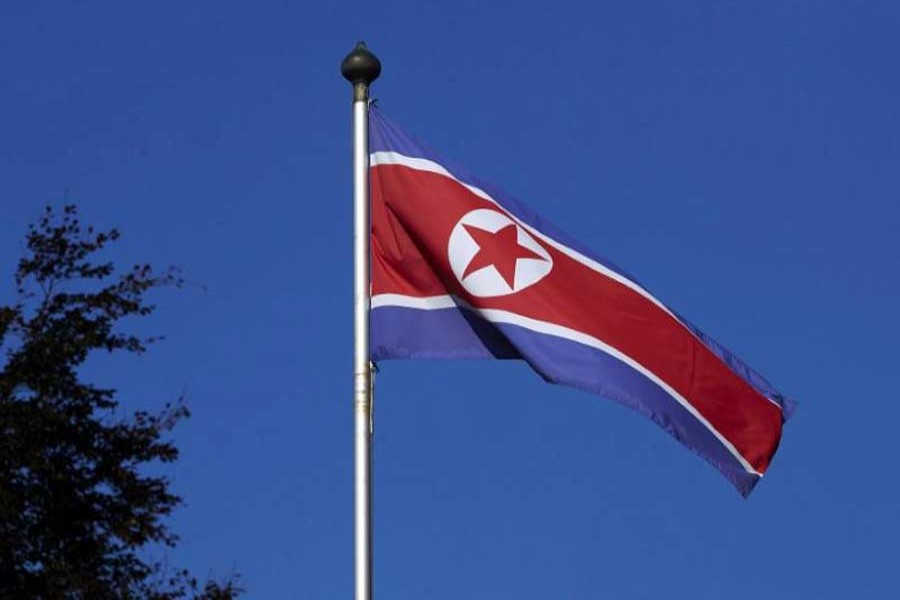 A North Korean flag flies on a mast at the Permanent Mission of North Korea in Geneva October 2, 2014. Reuters/File Photo
