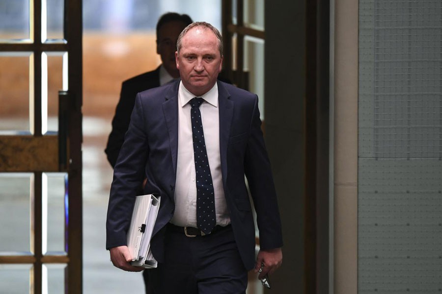 Australian Deputy Prime Minister Barnaby Joyce arrives during House of Representatives Question Time at Parliament House in Canberra, Australia, February 13, 2018. (REUTERS)