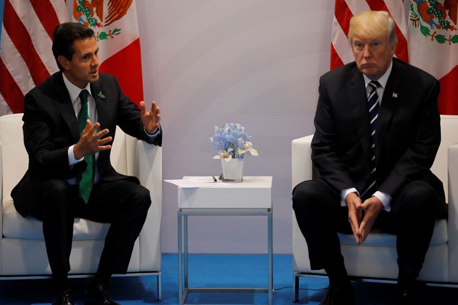 US President Donald Trump meets Mexico's President Enrique Pena Nieto during the bilateral meeting at the G20 summit in Hamburg, Germany July 7, 2017. (REUTERS)