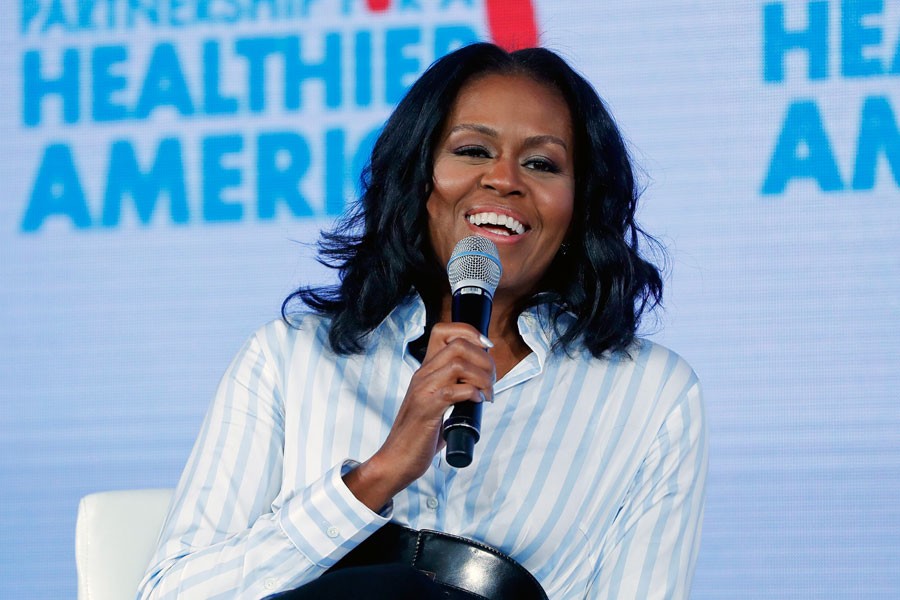 Former first lady Michelle Obama smiles while speaking at the Partnership for a Healthier American 2017 Healthier Future Summit in Washington. (AP File Photo)