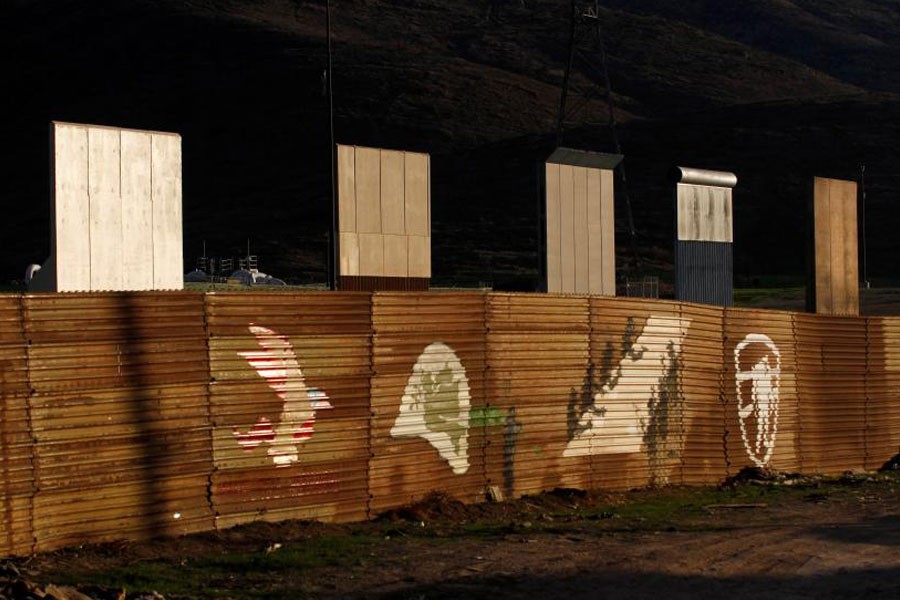 Prototypes for President Donald Trump's border wall with Mexico are seen behind the current border fence in this picture taken from the Mexican side of the border in Tijuana, Mexico. (REUTERS)