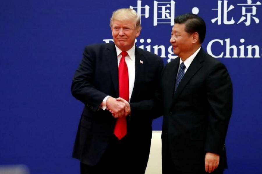 US President Donald Trump and China's President Xi Jinping meet business leaders at the Great Hall of the People in Beijing, China, November 9, 2017. Reuters/Files