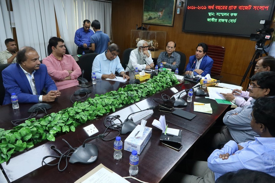 Leaders of Newspapers Owners' Association of Bangladesh (NOAB) participating in a pre-budget discussion with National Board of Revenue (NBR) chairman Md Mosharraf Hossain Bhuiyan in the capital on Wednesday — FE photo