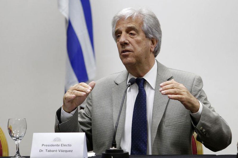 Newly elected Uruguayan President Tabare Vazquez gestures while announcing the ministers of his government at his office in Montevideo December 2, 2014. Reuters.