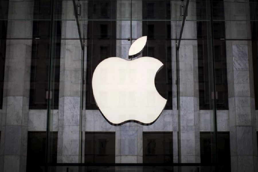 An Apple logo hangs above the entrance to the Apple store on 5th Avenue in the Manhattan borough of New York City, July 21, 2015. Reuters/File Photo