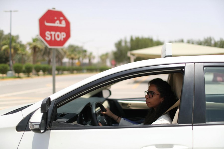 Trainee Maria al-Faraj stops the car at a stop sign during a driving lesson with her instructor at Saudi Aramco Driving Center in Dhahran, Saudi Arabia, June 6, 2018. Reuters/Files
