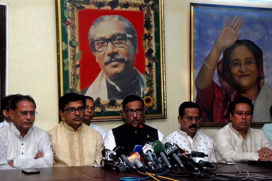 Road Transport And Bridges Minister Obaidul Quader addressing addressing a press conference at AL chief's political office in Dhanmondi area of Dhaka on Friday. -Focus Bangla Photo