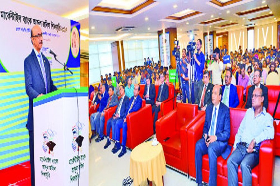 Governor of Bangladesh Bank Fazle Kabir addressing the "Mercantile Bank-Abdul Jalil Education Scholarship- 2017" awarding ceremony at a city hotel as the chief guest on Saturday. Mercantile Bank Chairman A.K.M. Shaheed Reza and Managing Director & CEO Kazi Masihur Rahman seen, among others