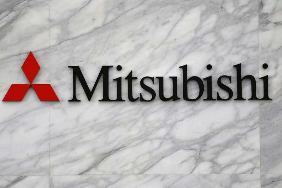 The logo of Mitsubishi Corporation is displayed at the entrance of the company headquarters building in Tokyo, Japan, April 26, 2016. Reuters/Files