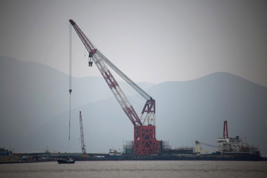 A crude oil terminal under construction is pictured off Ningbo Zhoushan port in Zhejiang province, China    	— Reuters