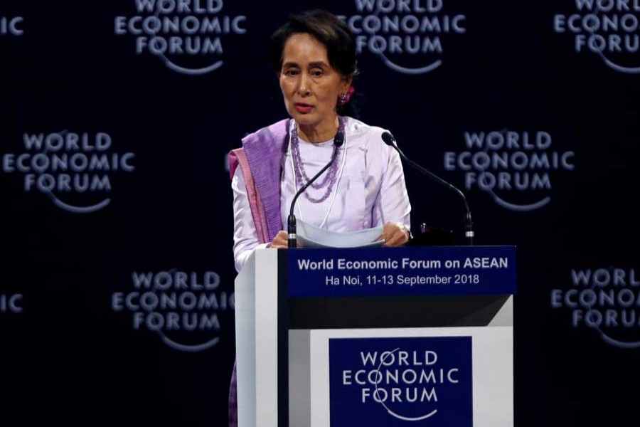 Myanmar State Counsellor Aung San Suu Kyi speaks at the plenary session of the World Economic Forum on ASEAN at the Convention Centre in Hanoi, Vietnam September 12, 2018. Reuters