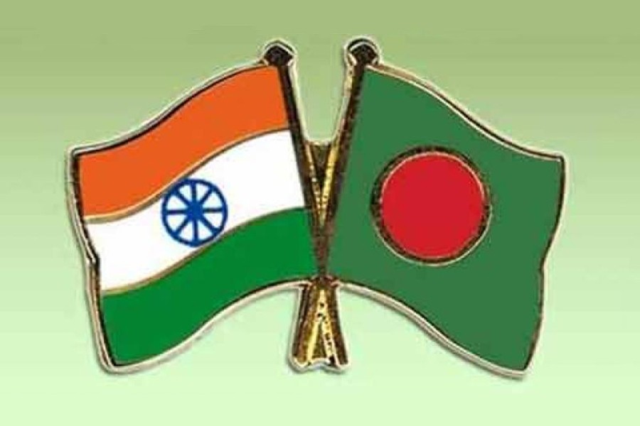 Bangladesh and India flags are seen cross-pinned in this photo symbolising friendship between the two nations — Collected