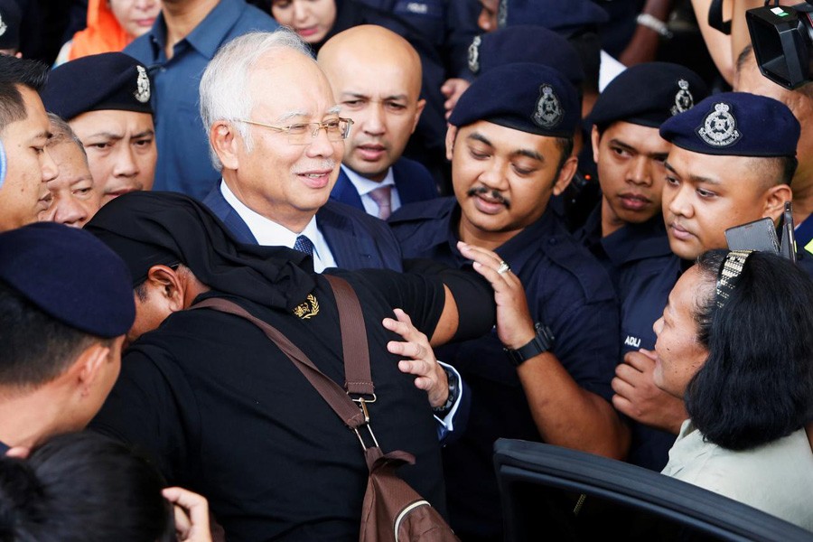 Malaysia's former Prime Minister Najib Razak leaves a court in Kuala Lumpur, Malaysia October 4, 2018. Reuters