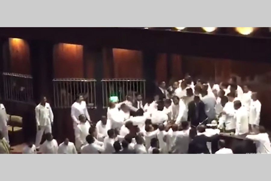 Sri Lankan MPs fight in parliament as power struggle deepens