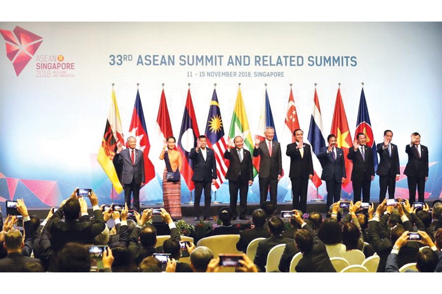 Leaders pose for photos during the opening ceremony of the 33rd summit of the Association of Southeast Asian Nations (ASEAN) in Singapore, on November 13, 2018: "As the European Union faces its first 'exit' this 2019, amid other powerful anti-regionalism sentiments triggered by immigrants and economic sclerosis, ASEAN partners are on the upswing: not consolidating ASEAN identities as much as teaming up with other Asian countries and outfits, even reaching out to Australia and New Zealand."     –Photo: Xinhua   
