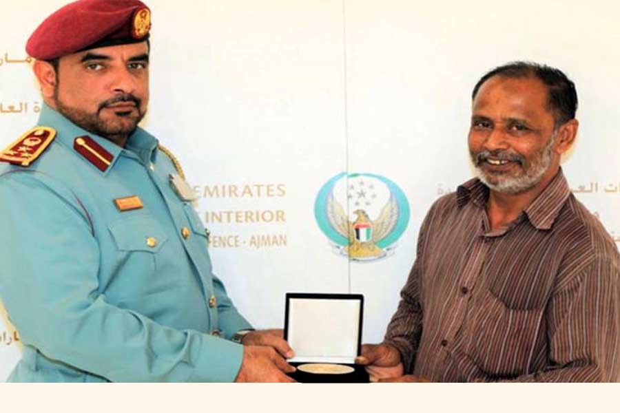 Ajman Civil Defence honoured Farouk Islam Nour Al Haq, a Bangladeshi national, for saving the life of a three-year-old boy who was flung from a burning building. Photo: Instagram