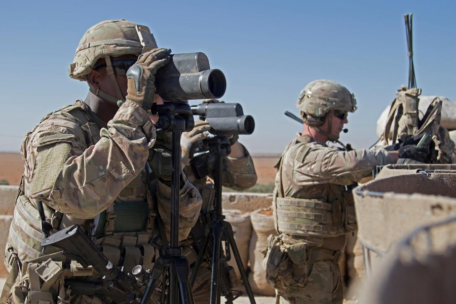 US Soldiers surveil the area during a combined joint patrol in Manbij, Syria, November 1, 2018. Courtesy Zoe Garbarino/US Army/Handout via Reuters/File Photo