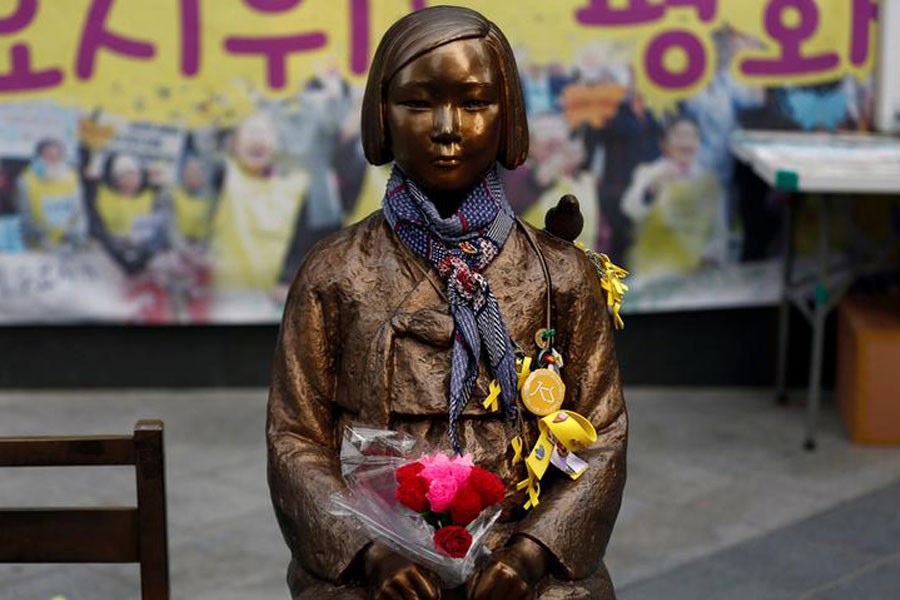 A 'comfort woman' statue is pictured in front of the Japanese embassy in Seoul, South Korea - Reuters file photo