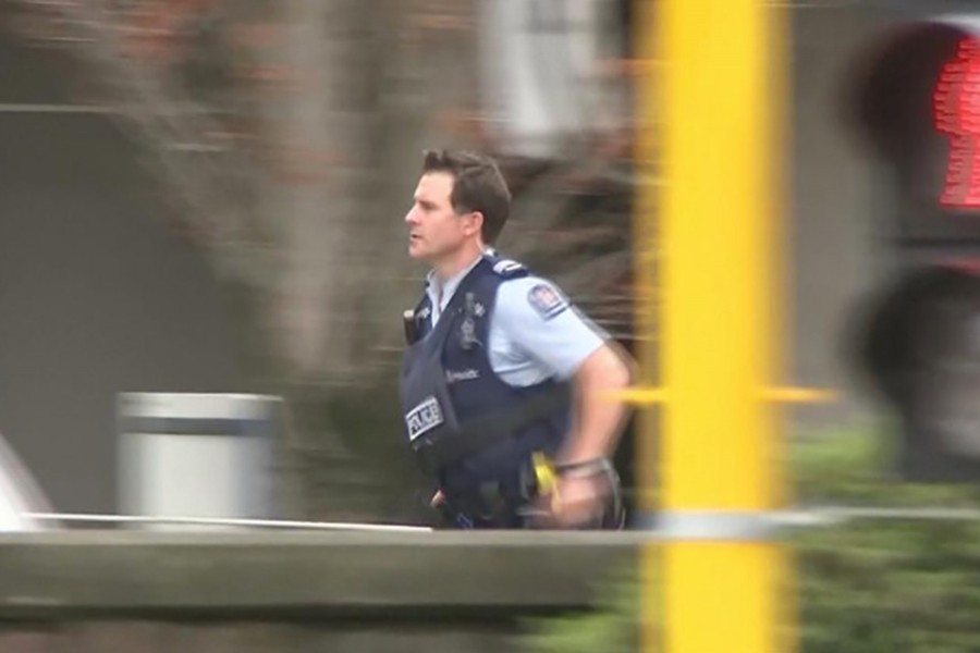 A police officer is seen after reports that several shots had been fired at a mosque, in central Christchurch, New Zealand March 15, 2019, in this still image taken from video — via Reuters