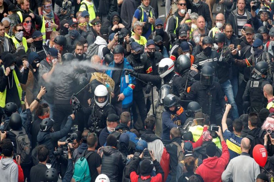 Demonstrators clash with police on May Day in Paris