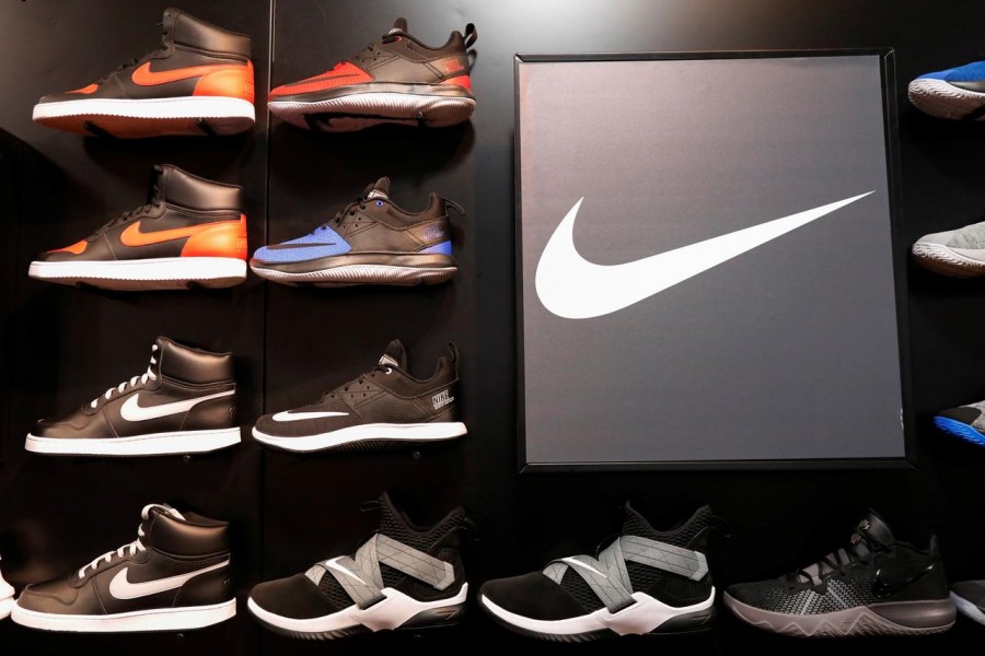 FILE PHOTO: Nike shoes are seen on display in New York, US, March 18, 2019 - REUTERS/Shannon Stapleton