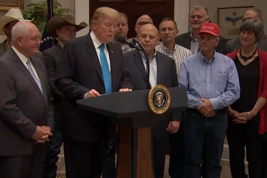 Trump unveils $16b aid package for farmers hit in trade war