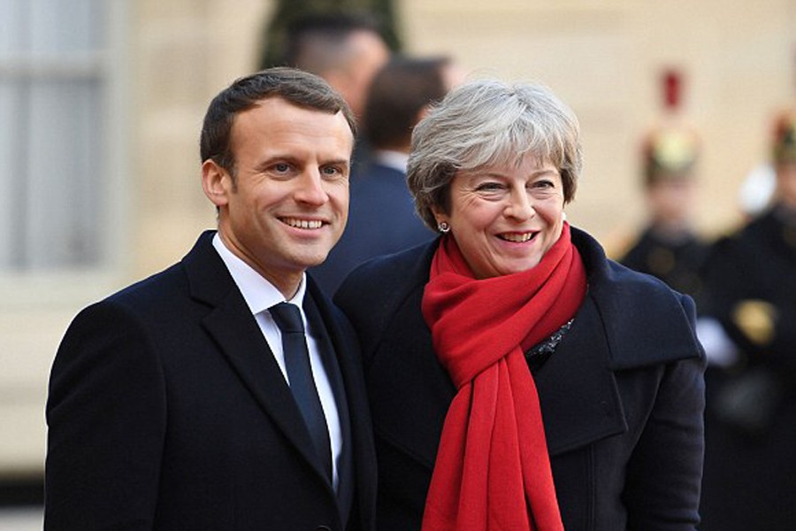 D-Day: May and Macron in France to mark 75th anniversary