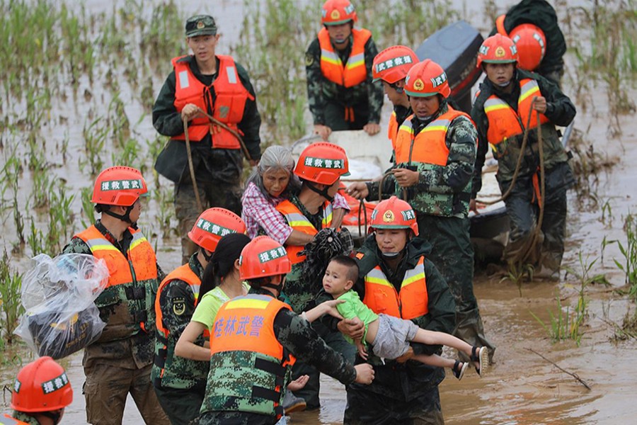 Paramilitary personnel rescue stranded villagers at a flooded field in Guilin in Guangxi Zhuang Autonomous Region, China on June 9, 2019 — Reuters photo