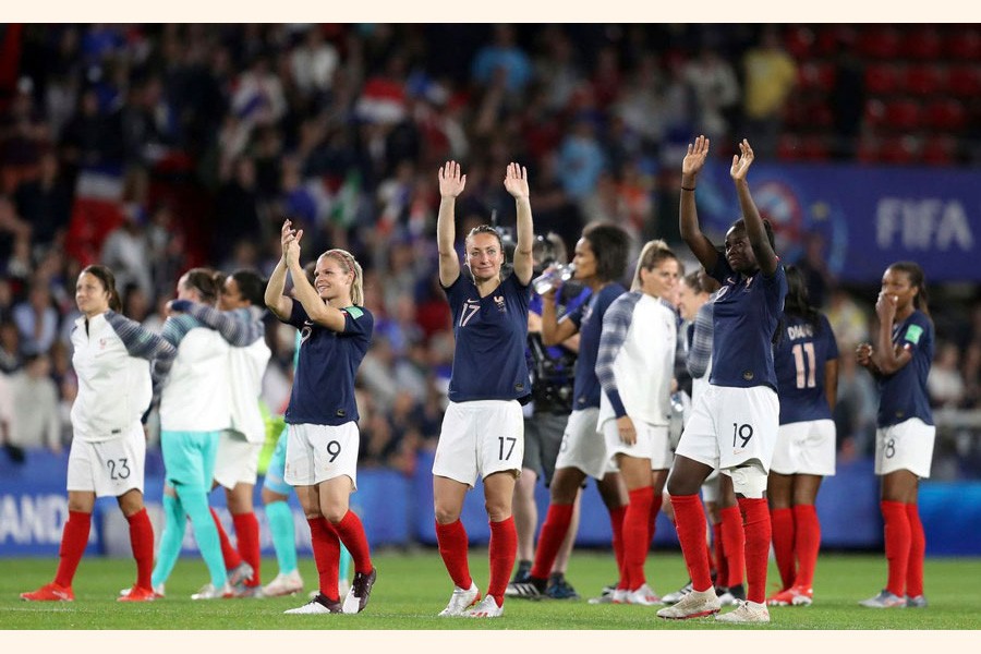 France players celebrating at the end of the Women's World Cup Group A football match between Nigeria and France at the Roazhon Park in Rennes on Monday	— AP