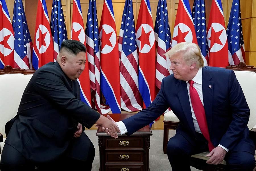 Trump shakes hands with Kim Jong-Un as they meet at the demilitarised zone separating the two Koreas, in Panmunjom, S.Korea on June 30.        — Photo: Reuters